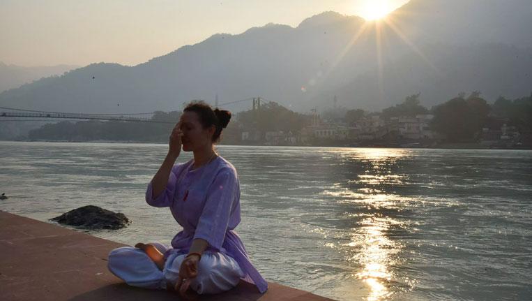 Rishikesh tourism showcasing yoga, Ganga river, adventure activities and spiritual travel experiences