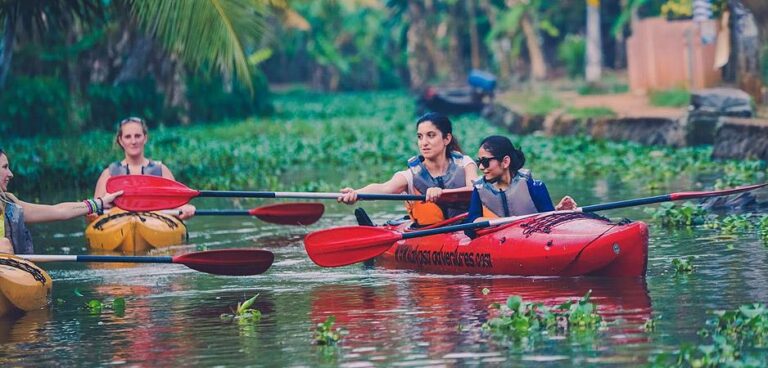 Kerala women kayaking club Harithatheeram paddling in village canal
